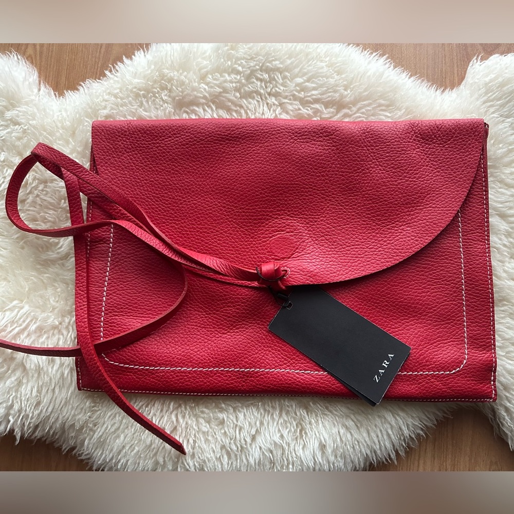 Leather envelope - 13”W - 9 1/4”H - 1” D, Fit tablet and small laptop.